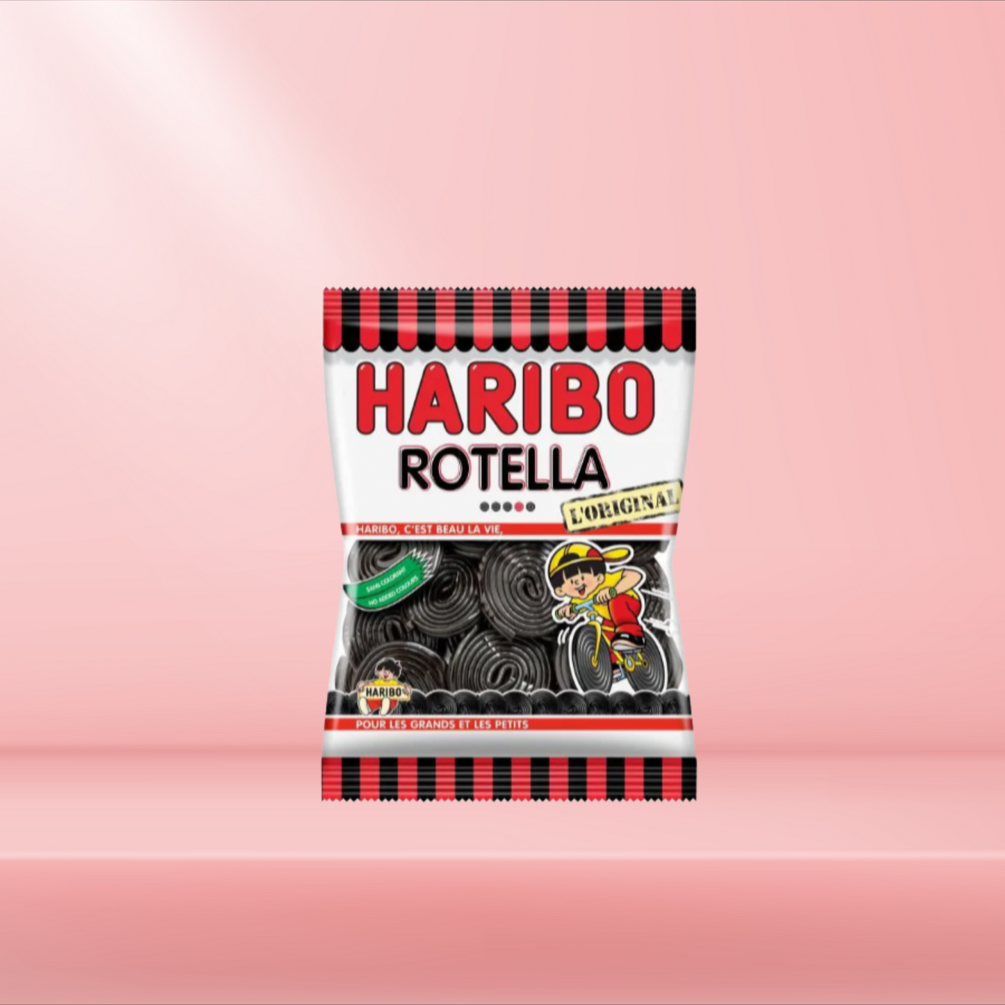 Sachet de bonbons Haribo Rotella, rouleaux de réglisse à dérouler et savourer, sur fond rose.